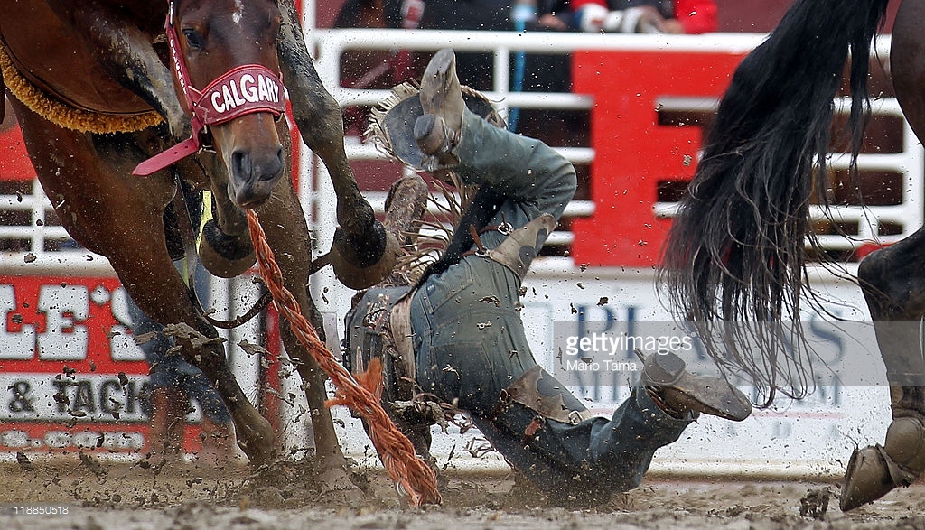 Bronco busting at the Calgary Stampede, July 11, 2011. Getty Images.